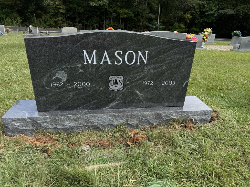mason American black granite upright headstone